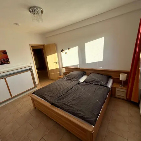 Appartamento M 5, Am Maigloeckchenberg 21